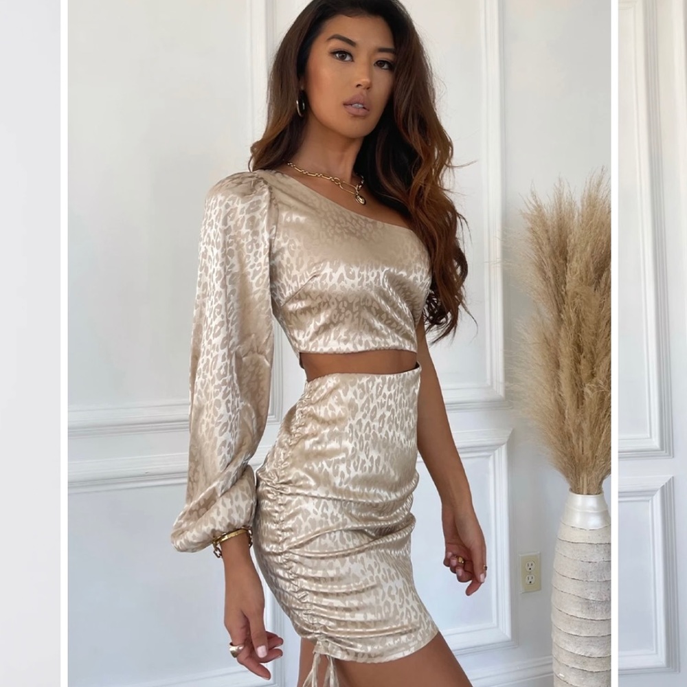 A beautiful one shoulder dress by Runaway the Label a popular Australian brand.